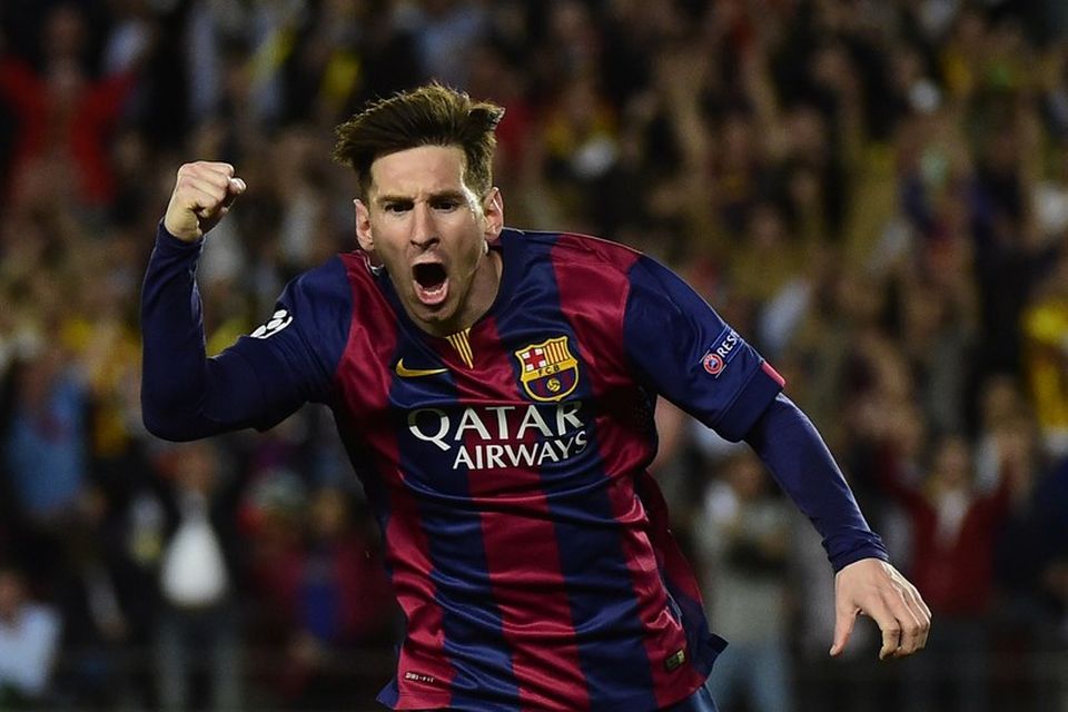Lionel Messi fagnar öðru marka sinna í kvöld.