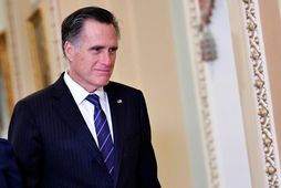Mitt Romney skráði sig í sögubækurnar með atkvæði sínu í gær.