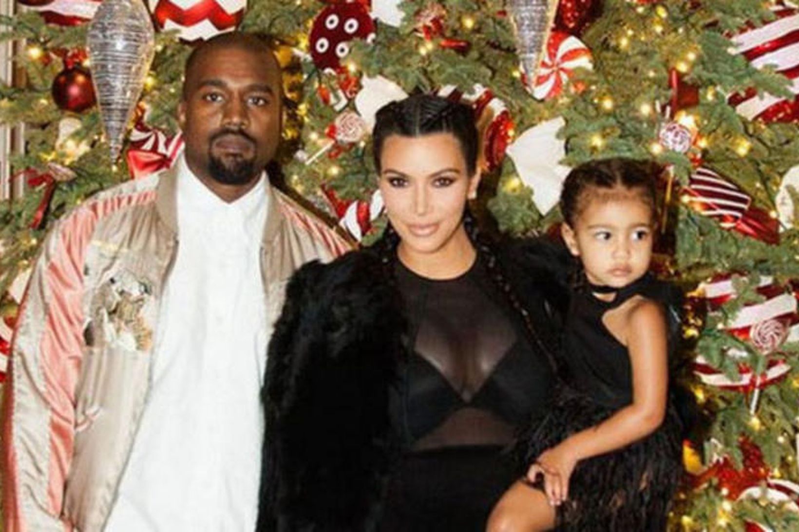 Kanye West, Kim Kardashian og dóttir þeirra North West.