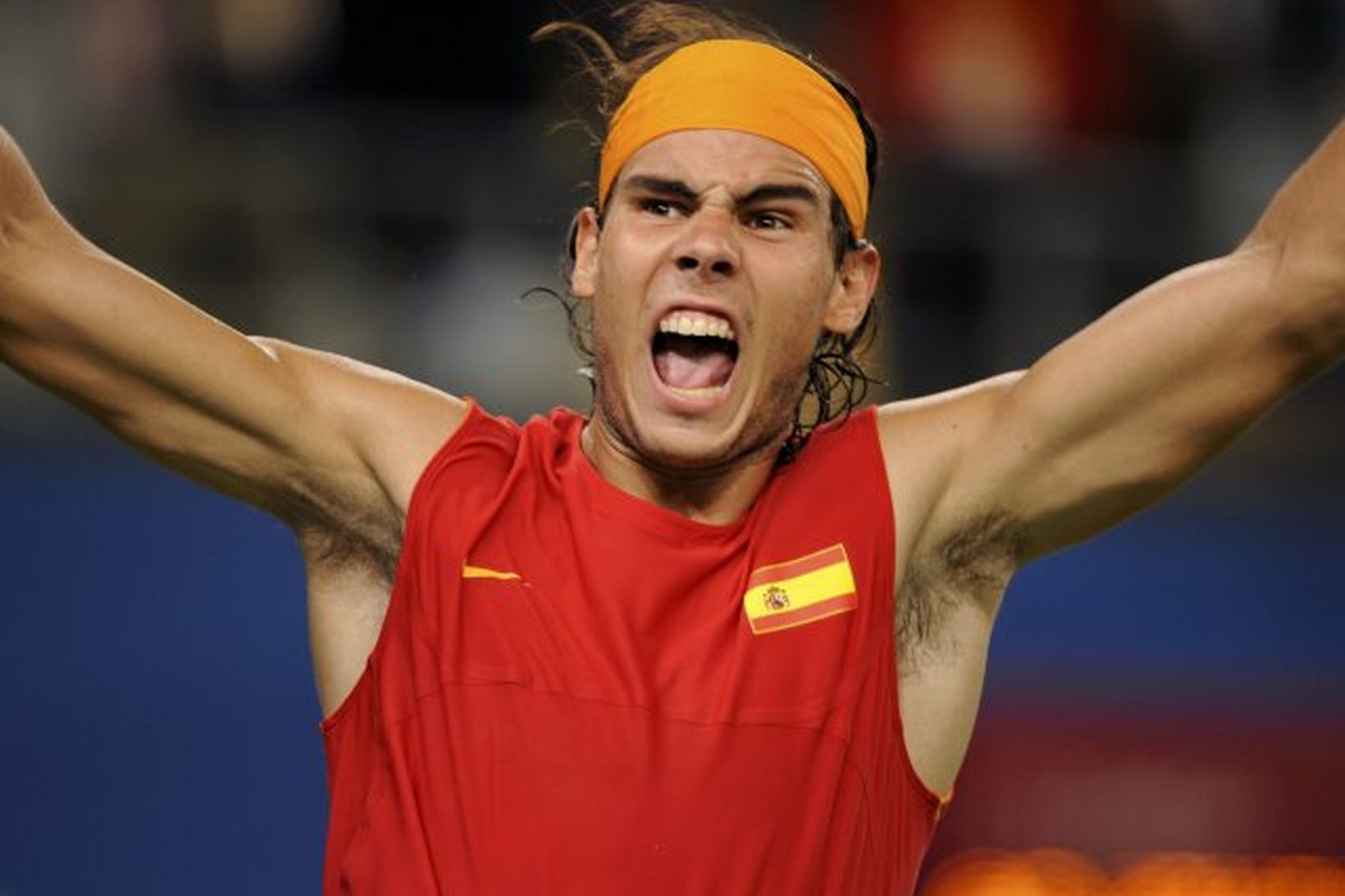 Rafael Nadal með appelsínugula hausklútinn.