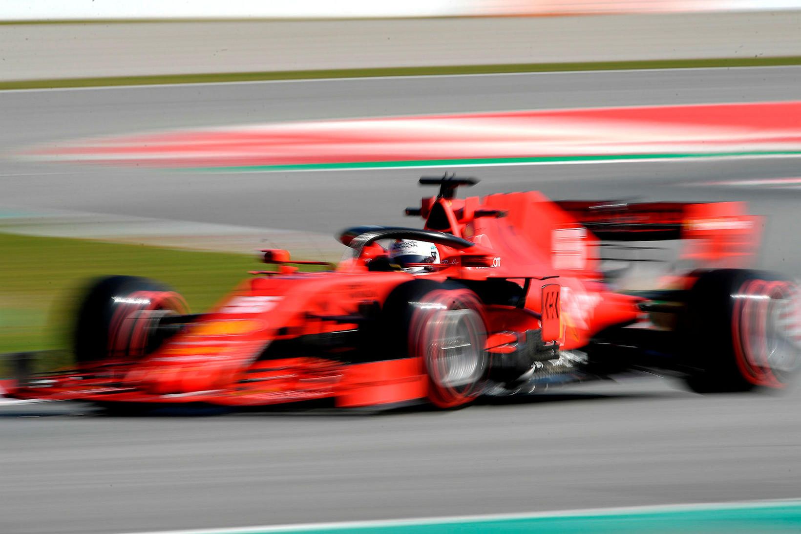 Sebastian Vettel var fljótastur í förum í Barcelona í daga. …