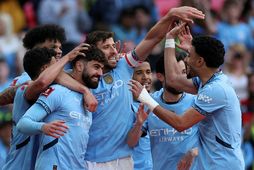 Liðsmenn Manchester City fagna í dag.