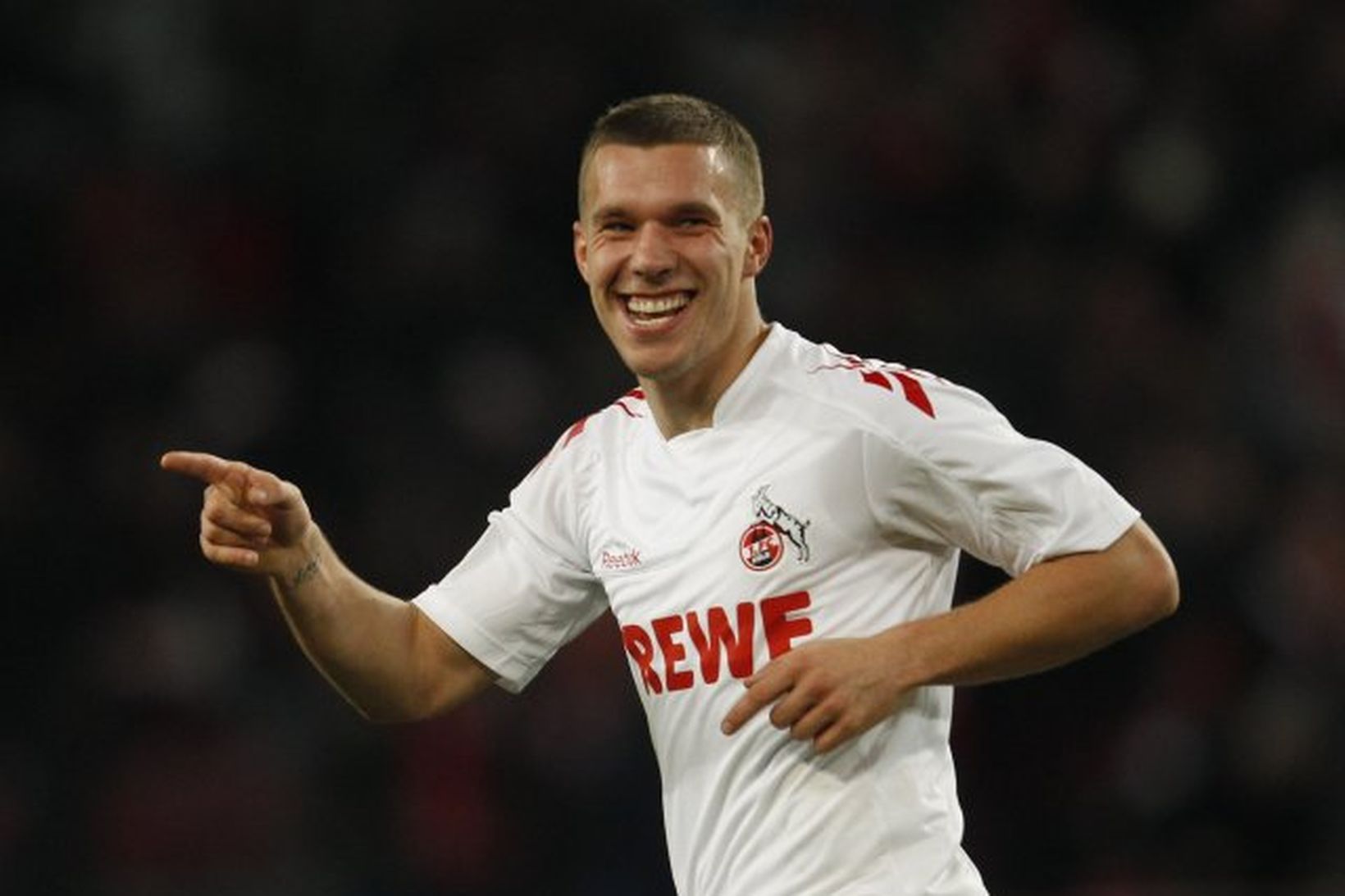 Lukas Podolski fagnar marki fyrir Köln.