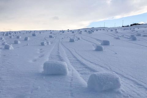Snow rollers at the Keilir golf course yesterday.