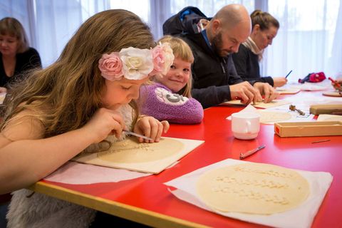 Children and adults alike love the art of leaf bread making.