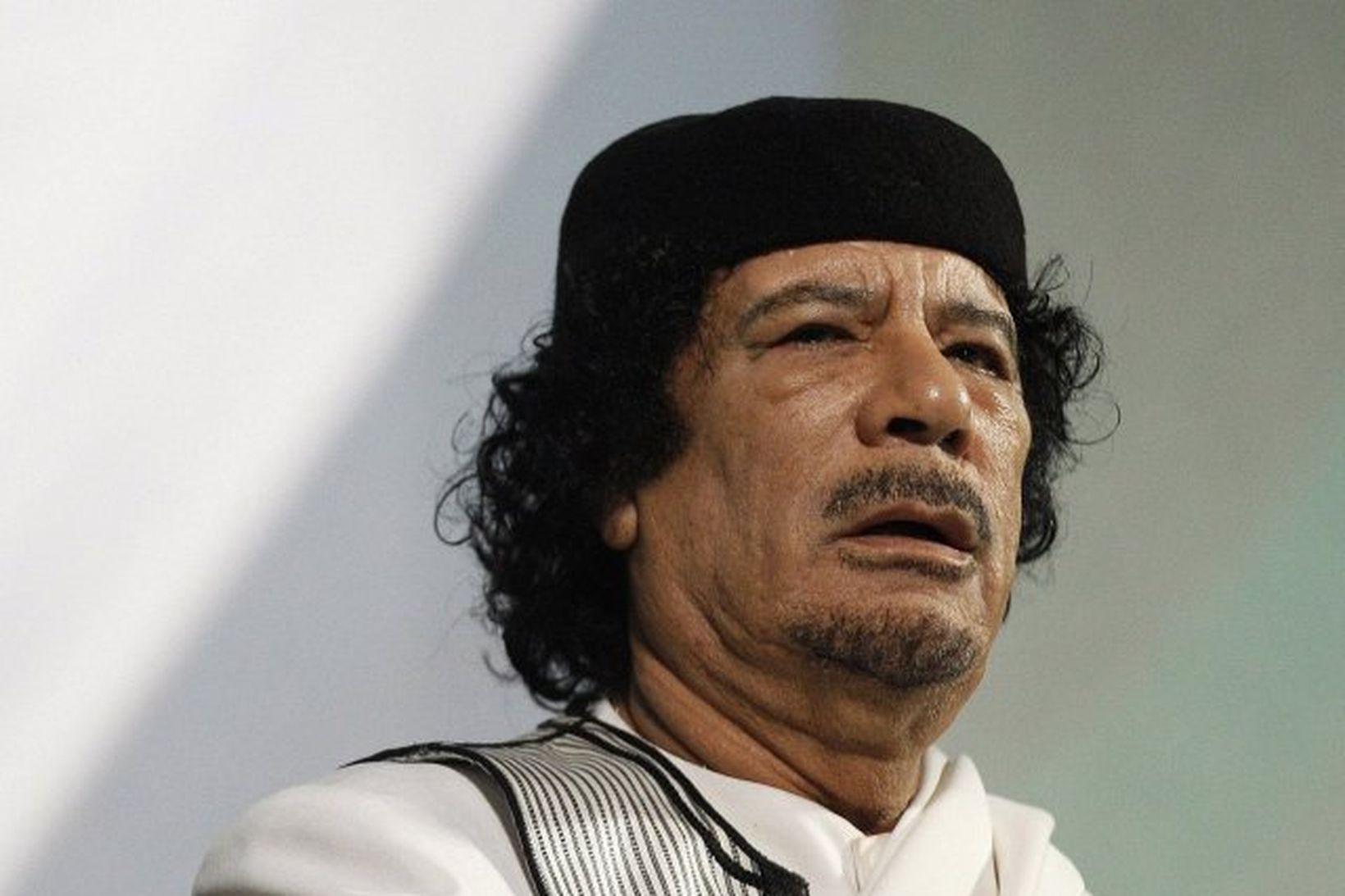 Múammar Gaddafi.