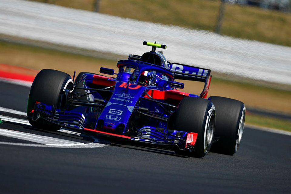 Toro Rosso's French driver Pierre Gasly drives during the second practice session at Silverstone motor …
