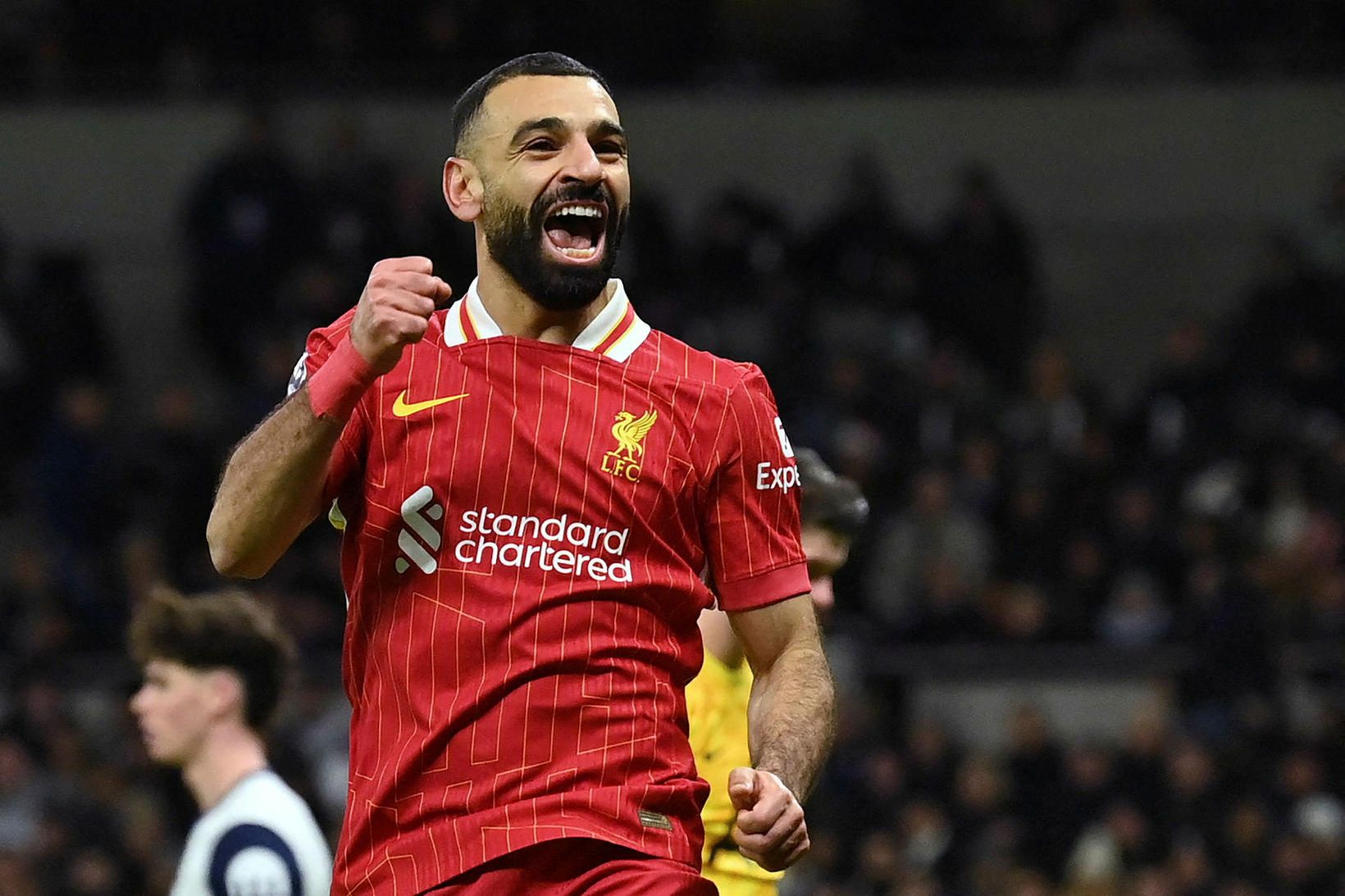 Mohamed Salah fagnar marki gegn Tottenham í gær.