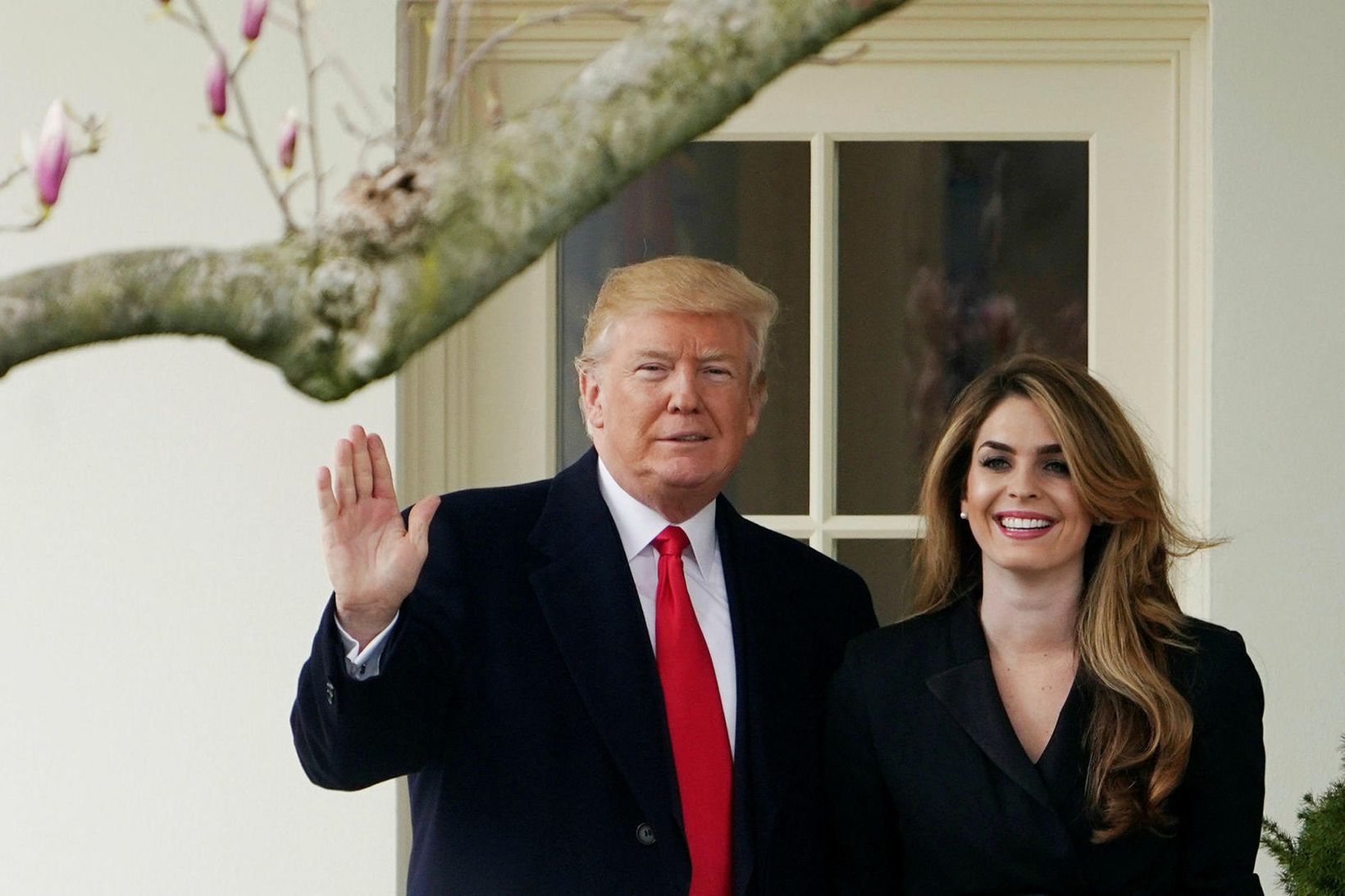 Hope Hicks með Donald Trump í marslok 2018.