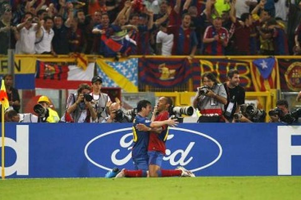 Messi og Thierry Henry fagna markinu.