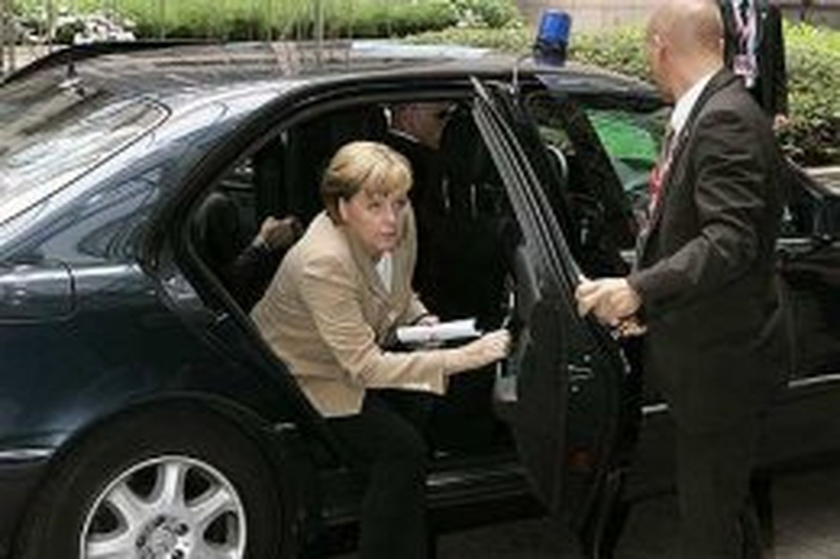 Angela Merkel kemur til fundarstaðar í Brussel í morgun.