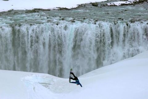 Snowboarding in front of Iceland's most powerful waterfall, Dettifoss.