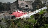 Leifar af Air- India flugvélinni sem hrapaði í Ahmedabad.