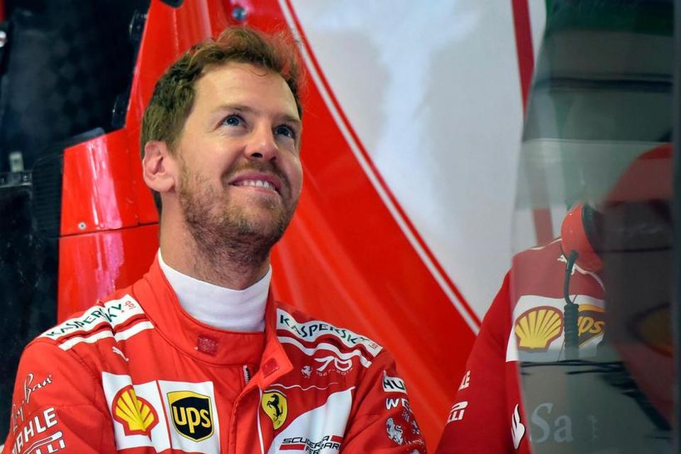 Sebastian Vettel í bílskúr Ferrari í Sotsjí í dag.
