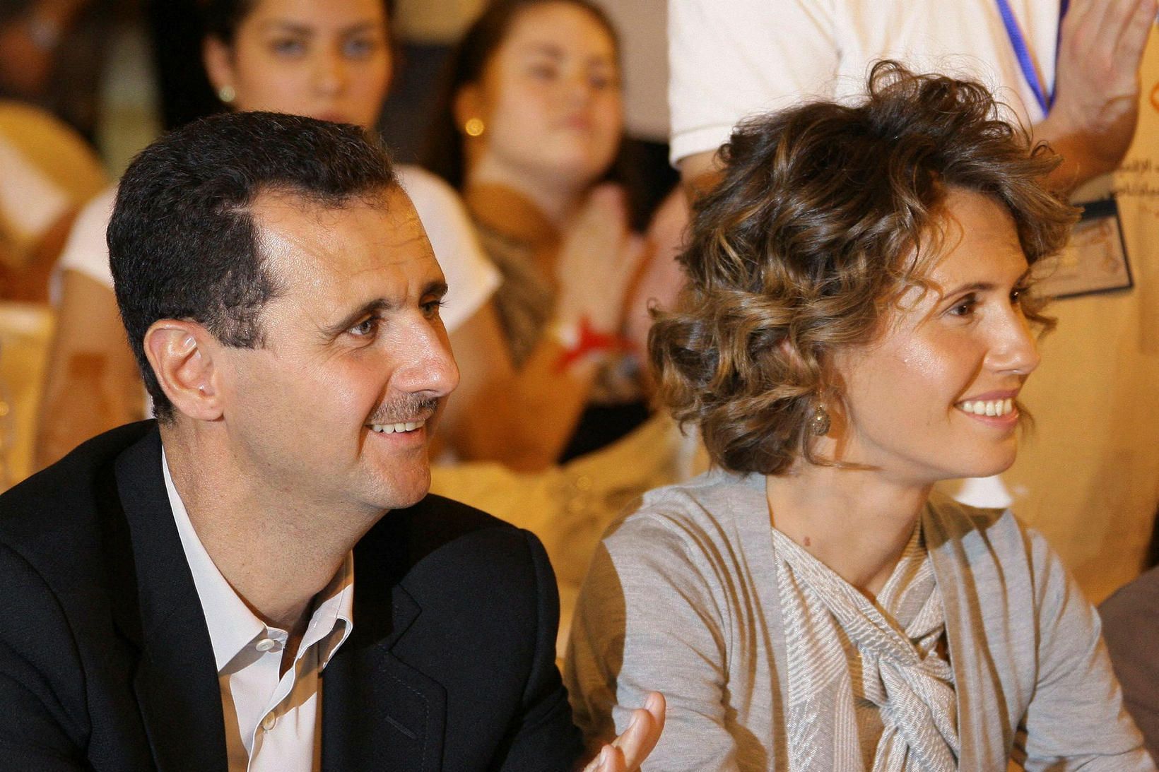 Bashar Assad ásamt eiginkonu sinni.