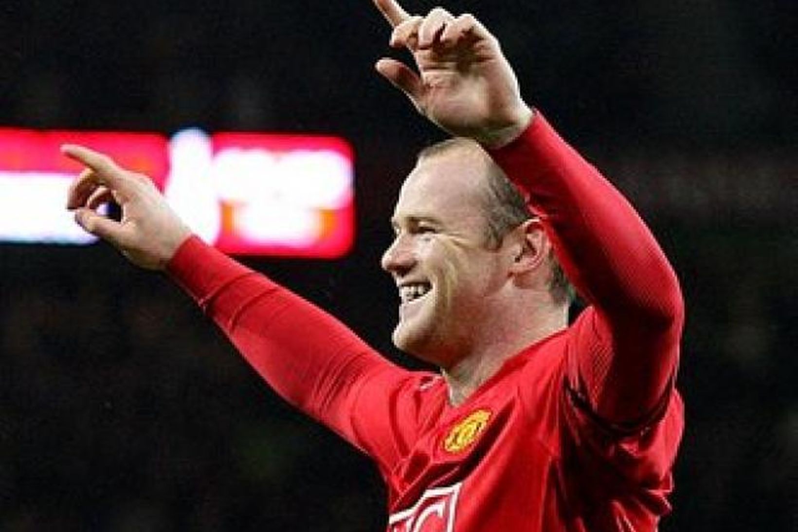 Rooney fagnar marki með Manchester United.