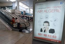 Auglýsing frá Air Algerie á flugvellinum í Algeirsborg.