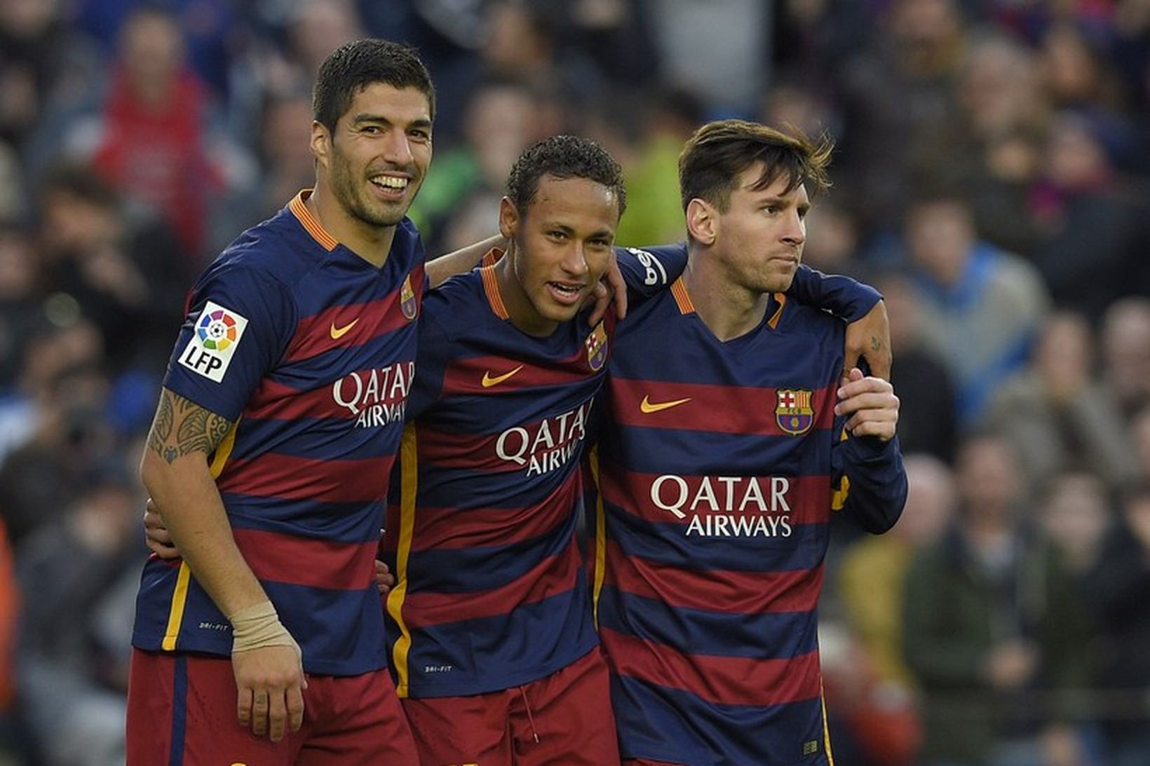 Luis Suarez, Neymar og Lionel Messi fagna einu af þremur …