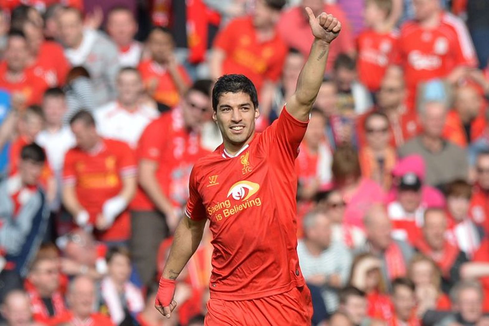 Luis Suárez lék með Liverpool frá 2011 til ársins 2014.