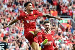Luis Díaz fagnar marki gegn Arsenal í toppslag úrvalsdeildarinnar í gær, sem endaði 2:2.