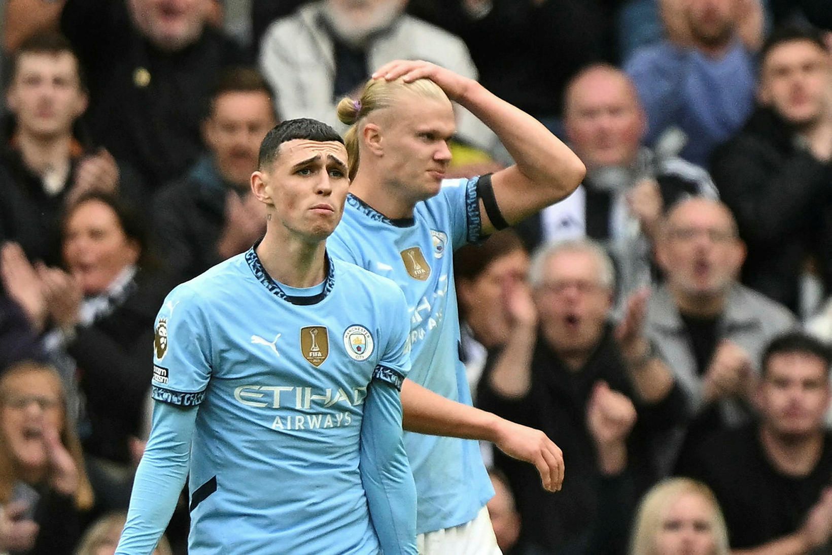 Phil Foden og Erling Haaland.