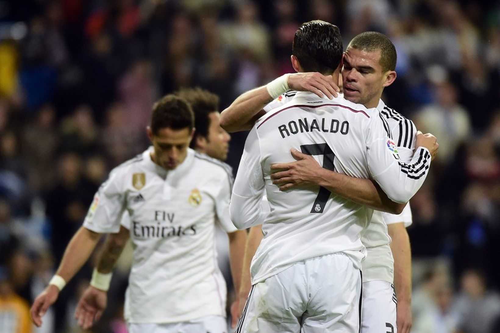 Pepe og Cristiano Ronaldo fagna þriðja markinu í kvöld.