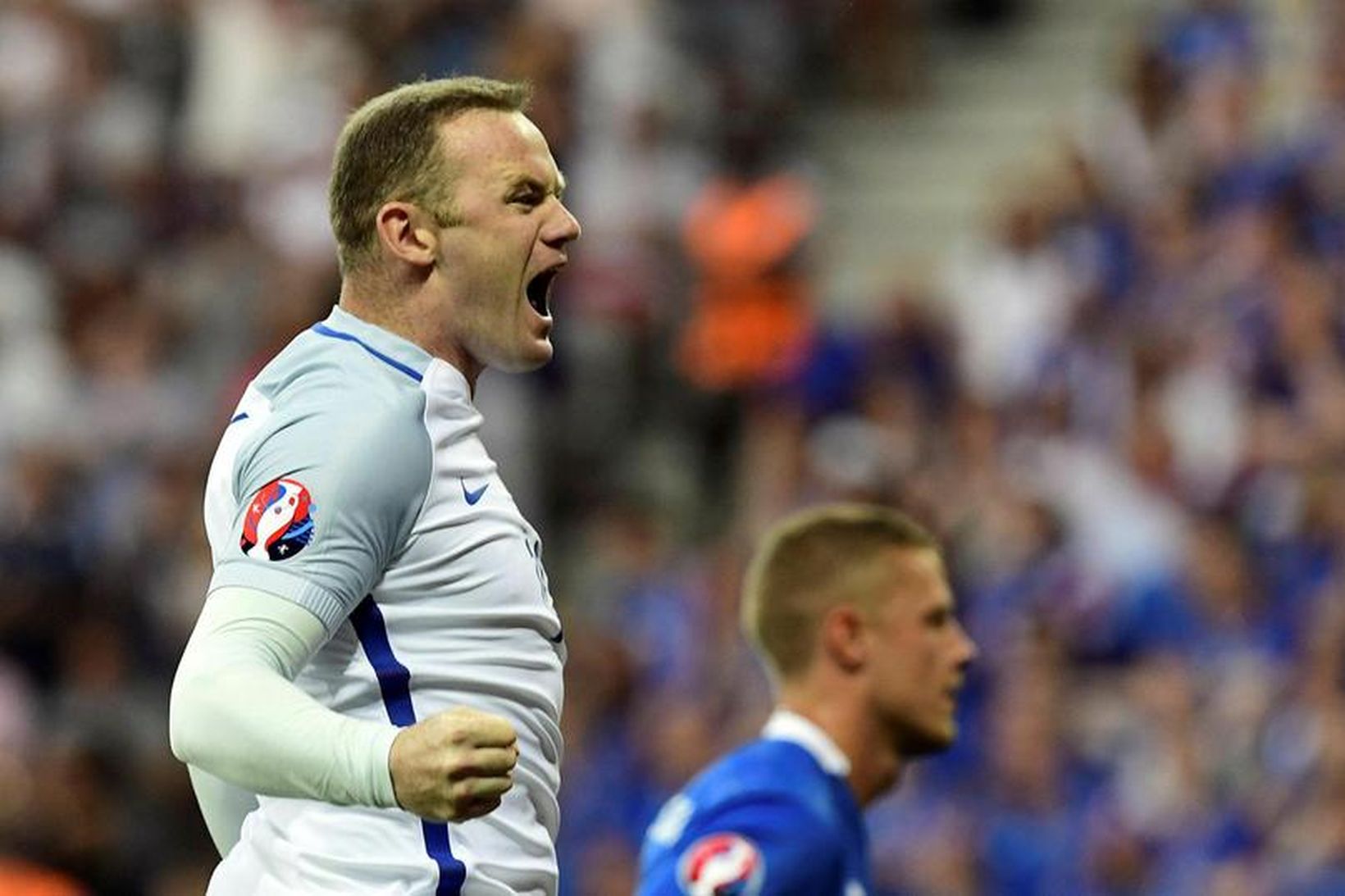 Wayne Rooney fagnar vítaspyrnumarkinu gegn Íslandi á EM 2016.
