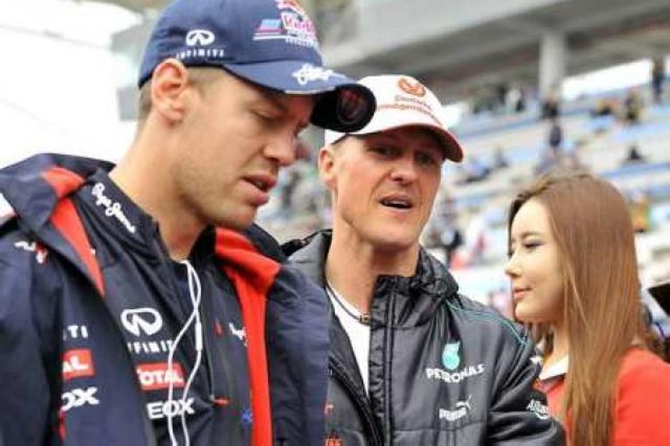 Schumacher með arftaka sínum, Sebastian Vettel, í Suður-Kóreu.