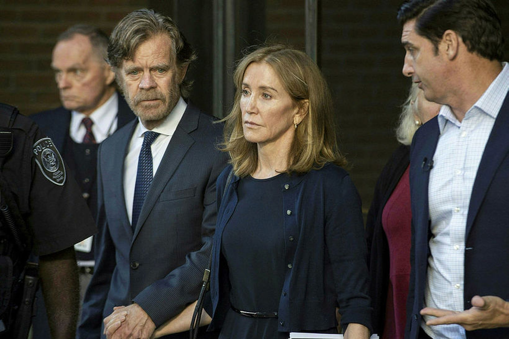 Actress Felicity Huffman, escorted by her husband William H. Macy …