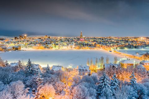 The centre of Reykjavik showing Lake Tjornin and in the distance, Hallgrímskirkja church towers above the landscape.