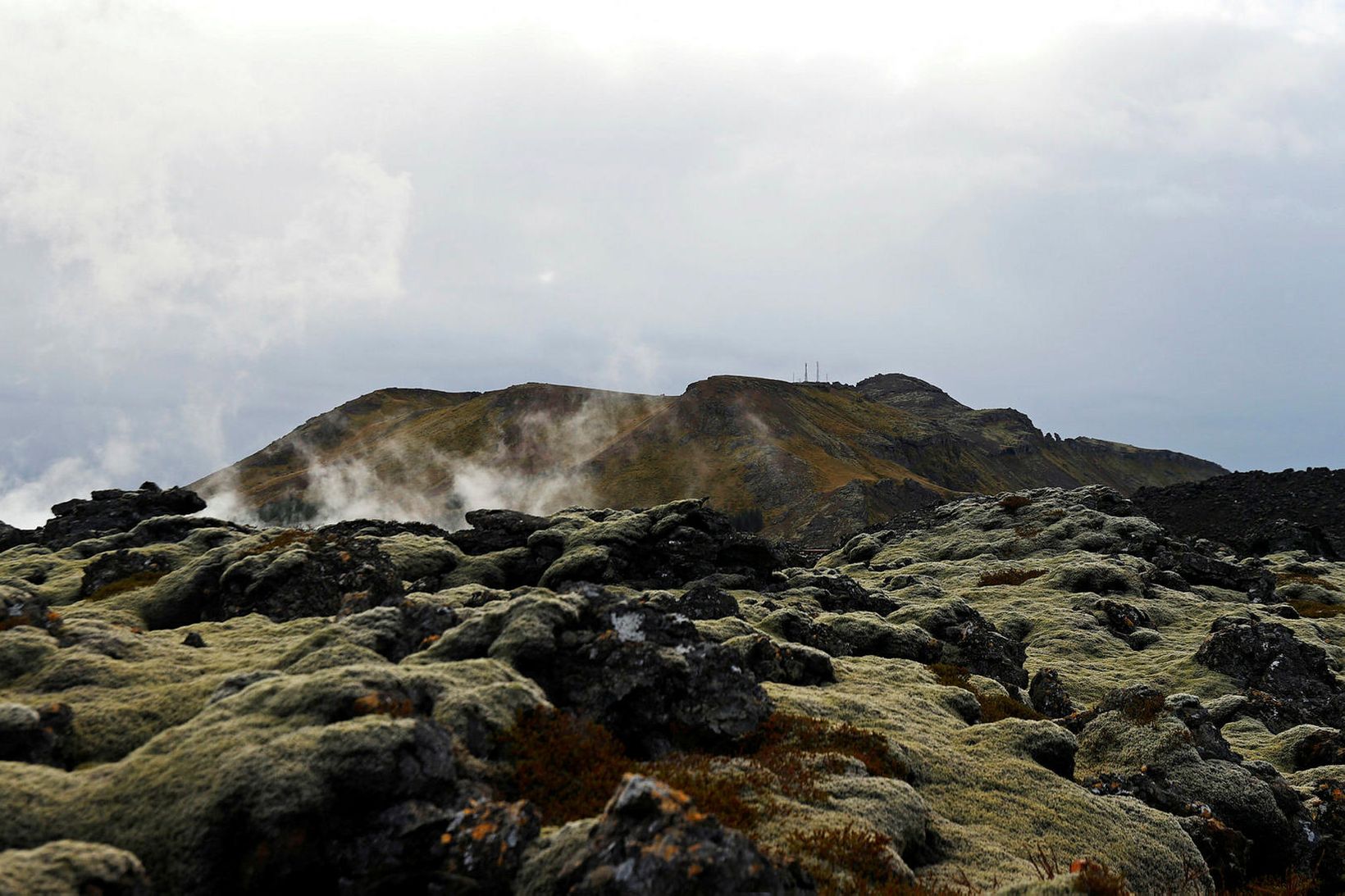 Horft yfir hraunbreiðu og að Þorbirni, sem rís suðaustur af …