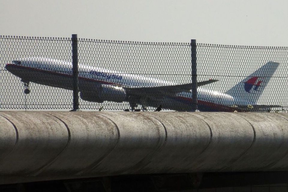 Malasíska farþegaþotan, flug MH17, tekur á loft frá Schiphol í gær, 17. júlí 2014.