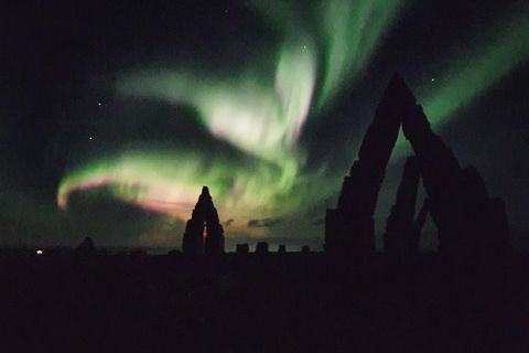 The northern lights, with the Arctic Henge in the foreground.
