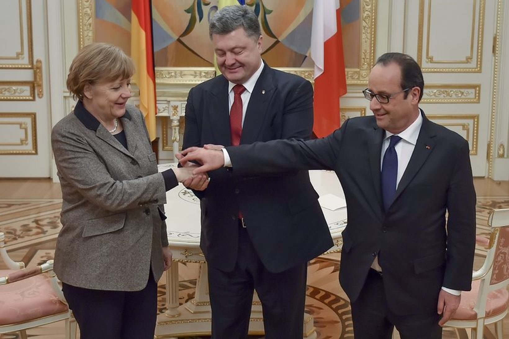 Angela Merkel, Petró Porósjenkó og François Hollande