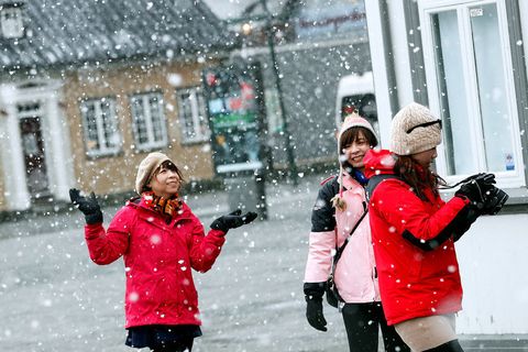 Tourists surprised by yesterday's snowfall.