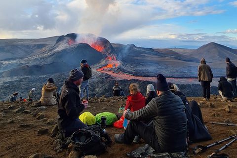 Hikers enjoy the view of the eruption on this photo taken on May 30th.