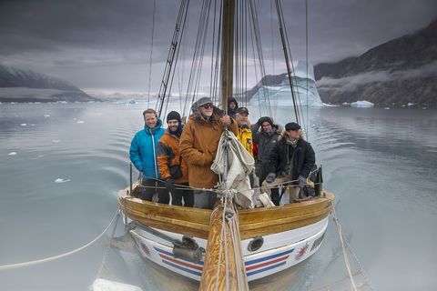 Members of the expedition sail on the boat Hildur into Scoresby Sound, the longest fjord system in the world:  Heiðar Guðjónsson, Óskar Þór Axelsson, Haraldur Sigurðsson, Áki Ásgeirsson, Hörður Sigurbjarnarson, Júlíus Kemp and Tómas Örn Tómasson.