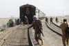 Vígamenn halda 450 lestarfarþegum í gíslingu í Pakistan