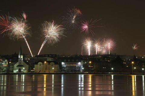 Fireworks seen from Lake Tjörnin in Reykjavik last New Year's Eve.