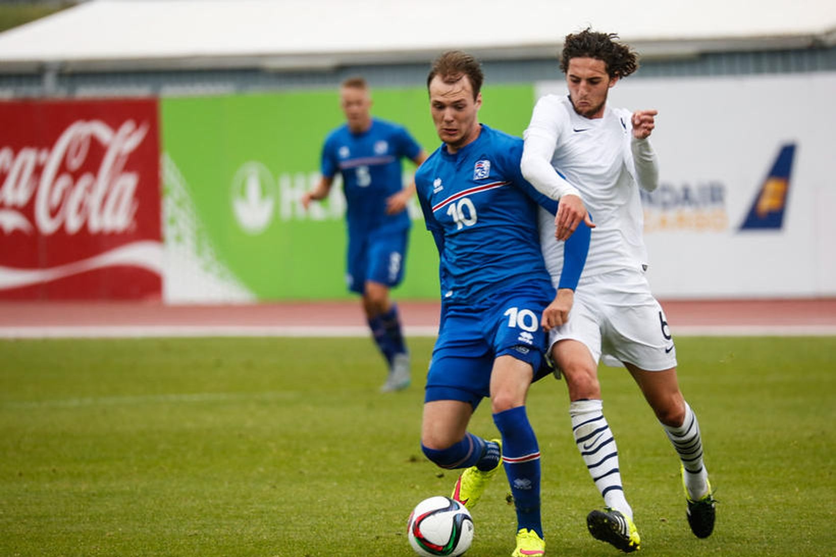 Aron Elís Þrándarson og Adrien Rabiot í leiknum í dag.