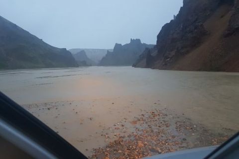Rivers were swelling in the highlands last night.