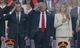 Trump flexes military might at parade as protests sweep US