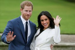 Harry og eiginkona hans Meghan Markle.