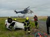 Emergency response exercise involving Coast Guard helicopters.