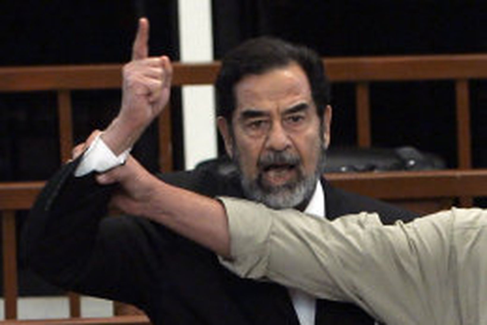 Saddam Hussein, fyrrum Íraksforseti, er dauðadómurinn var kveðinn upp yfir …