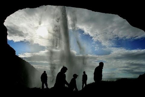 People are able once again to walk behind the waterfall.