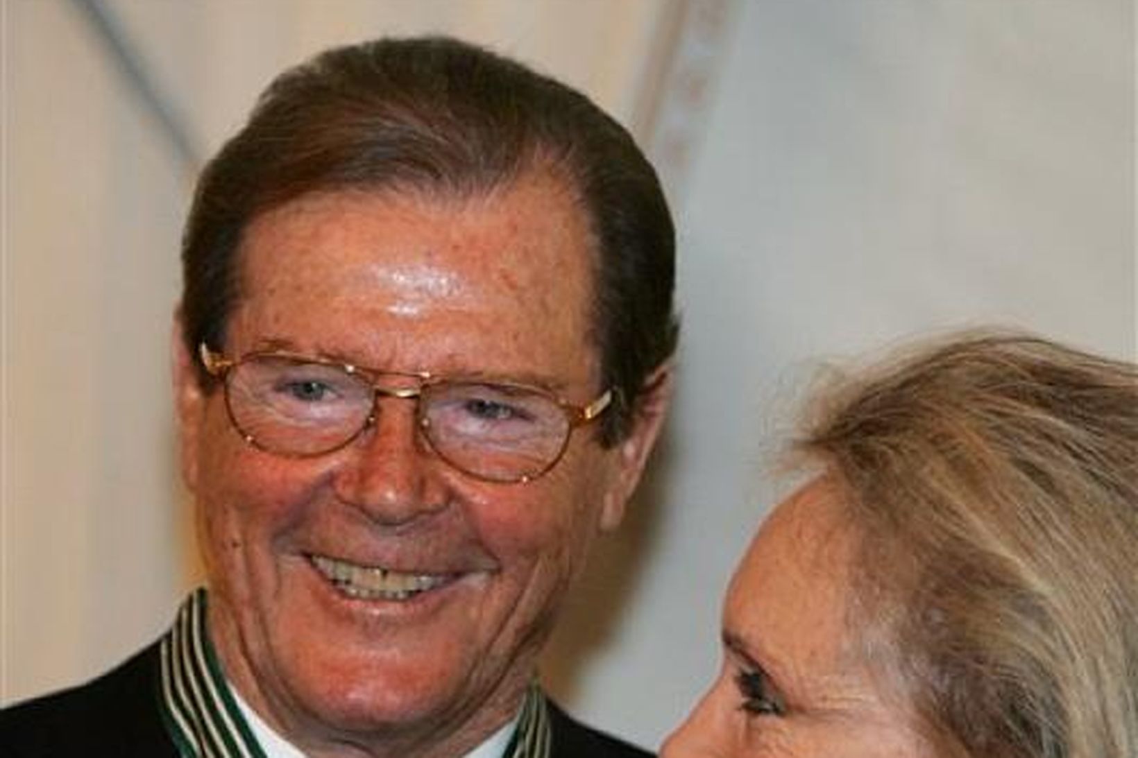 Breski leikarinn Roger Moore ásamt Christinu eiginkonu sinni.