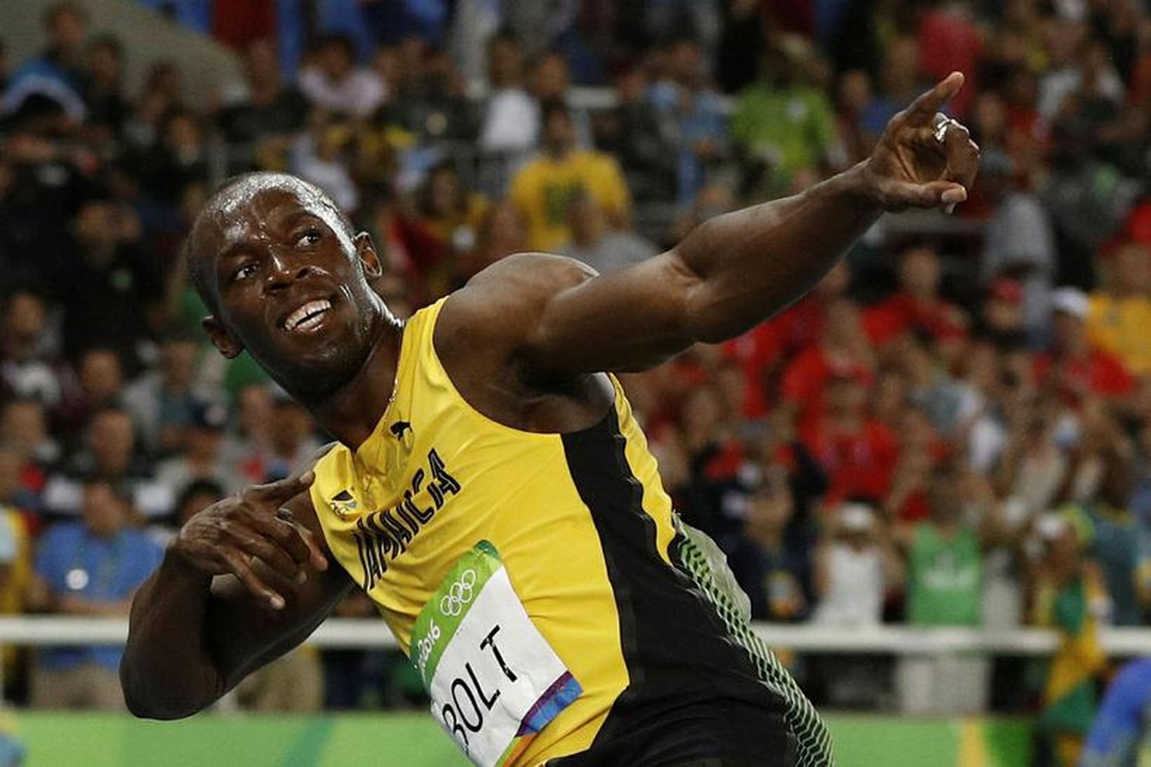 Usain Bolt fagnaði eins og hann er vanur, eftir hlaup …